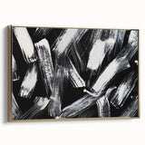 Framed black and white abstract wall art featuring bold geometric shapes and gold accents, displayed in a modern setting for contemporary decor.