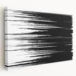 Abstract black and white stretched canvas wall art showcasing a modern design with bold contrasting patterns, ideal for contemporary decor.