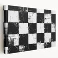 Abstract black and white stretched canvas wall art showcasing a modern design, emphasizing geometric shapes and dynamic patterns for contemporary decor.