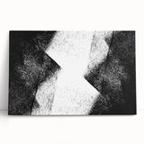 Abstract black and white wall art collection on stretched canvas, showcasing modern design with bold shapes and textures, perfect for contemporary decor.