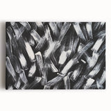 Abstract black and white stretched canvas wall art showcasing a modern geometric design, perfect for contemporary home decor.
