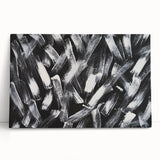 Abstract black and white wall art collection on stretched canvas, showcasing dynamic shapes and lines, perfect for modern decor.