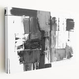 Abstract black and white wall art canvas with a modern design, showcasing bold geometric shapes and textures, ideal for contemporary decor.