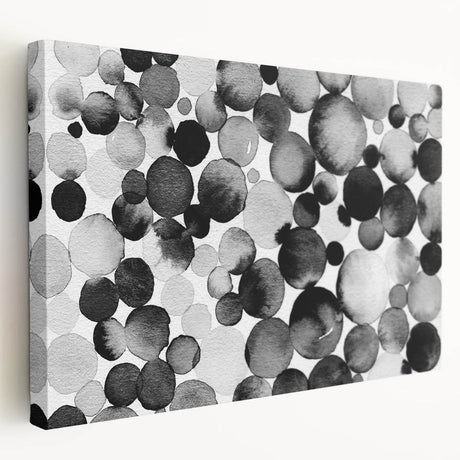 Abstract black and white wall art collection on stretched canvas, showcasing geometric patterns and unique textures from a side view.
