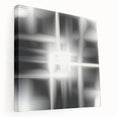 Abstract black and white stretched canvas wall art showcasing a modern design with dynamic shapes and textures, perfect for contemporary decor.