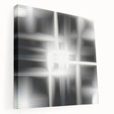 Abstract black and white stretched canvas wall art showcasing a modern design with dynamic shapes and textures, perfect for contemporary decor.