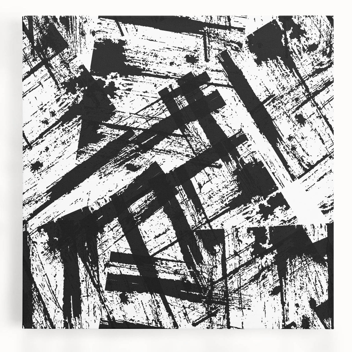 Abstract black and white wall art design on stretched canvas, showcasing dynamic shapes and patterns, ideal for modern home decor.