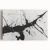 Abstract black and white stretched canvas wall art featuring bold geometric shapes and flowing lines, ideal for modern home decor.