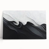 Black and white abstract wall art collection on stretched canvas, showcasing bold geometric shapes and textures, perfect for modern decor.