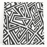 Abstract black and white wall art collection on stretched canvas, showcasing geometric shapes and textures, perfect for modern decor.