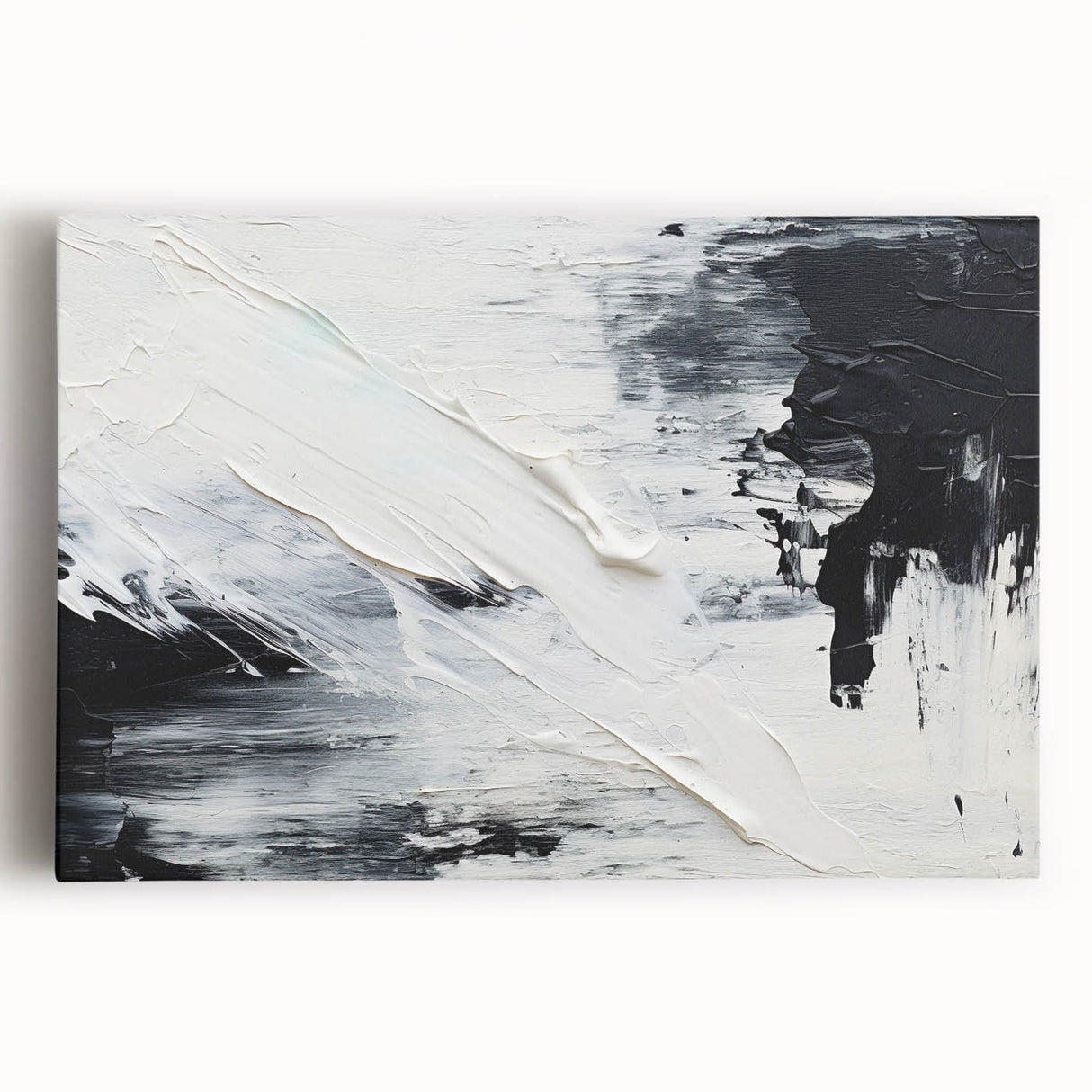 Abstract black and white wall art collection displayed on stretched canvas, showcasing bold geometric shapes and fluid designs for modern decor.