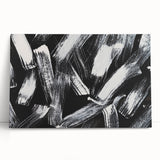 Abstract black and white wall art collection on stretched canvas, showcasing geometric patterns and textures, ideal for modern home decor.