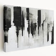 Stretched canvas artwork showcasing an abstract black-and-white design, emphasizing bold lines and geometric shapes, ideal for modern decor.