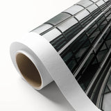 Black and white abstract art deco design on rolled canvas, featuring geometric shapes.