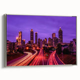 Vintage poster art of Atlanta skyline in vibrant colors on a large framed canvas, ideal for living room decor.