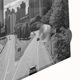 Mid-century modernist Atlanta skyline in muted gray and blue tones on a large acrylic print, ideal for dining room art.