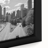 Framed canvas of Atlanta skyline in black with colorful, textured details, ideal for extra large living room wall art.