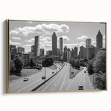 Framed canvas of Atlanta skyline in black and gold tones, ideal for bedroom wall decor.