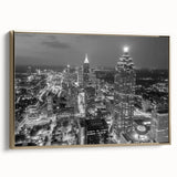 Framed canvas of Atlanta skyline in muted gold and black tones, suitable as wall art for a bedroom.