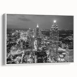Framed canvas featuring a vintage poster art of Atlanta skyline in vibrant colors, ideal for living room decor.