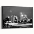 Black and white framed canvas of Atlanta skyline, ideal for bedroom wall art in vintage poster style.
