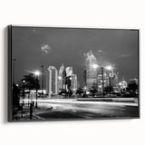 Black and white framed canvas of Atlanta skyline, ideal for bedroom wall art in vintage poster style.