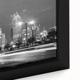 Close-up of a textured Atlanta skyline on framed canvas, with black and colorful art, ideal for extra large living room wall.