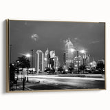 Framed canvas wall art of Atlanta skyline in black and gold tones, ideal for bedroom decor.