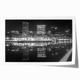 Rolled print of Baltimore skyline in muted gray and blue tones, ideal for dining room wall art.