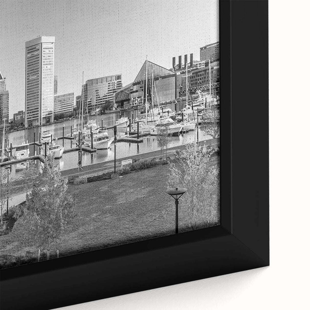 Framed canvas featuring a textured depiction of the Baltimore skyline in black with colorful accents.