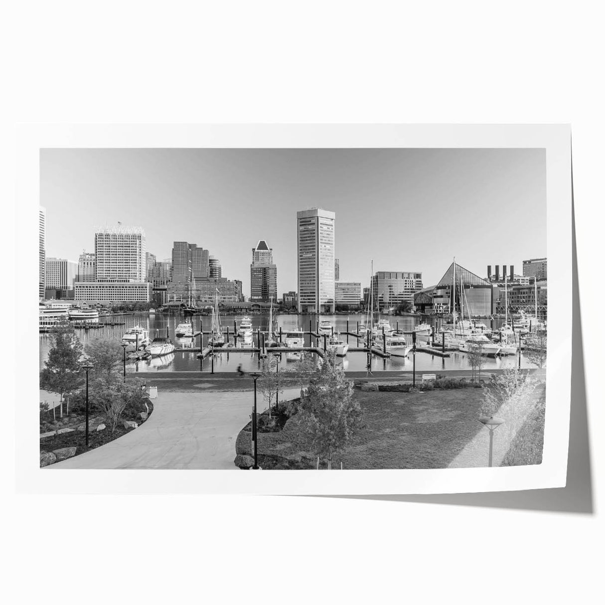 Rolled print of Baltimore skyline in muted gray and blue tones, ideal for art wall dining room.