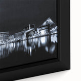 Baltimore skyline depicted in black with colorful, textured highlights on a large framed canvas.