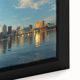 Framed canvas of Baltimore skyline in black with colorful, textured accents, ideal for living room decor.