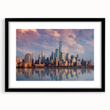 Abstract art print of New York City skyline in vibrant colors on a large framed canvas, suitable for living room decor.