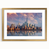 Extra large wall art featuring an abstract New York City skyline in muted gray and gold tones on a framed canvas.
