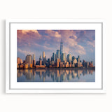 Abstract art print of New York City skyline in muted gray and blue tones on a framed white mat.