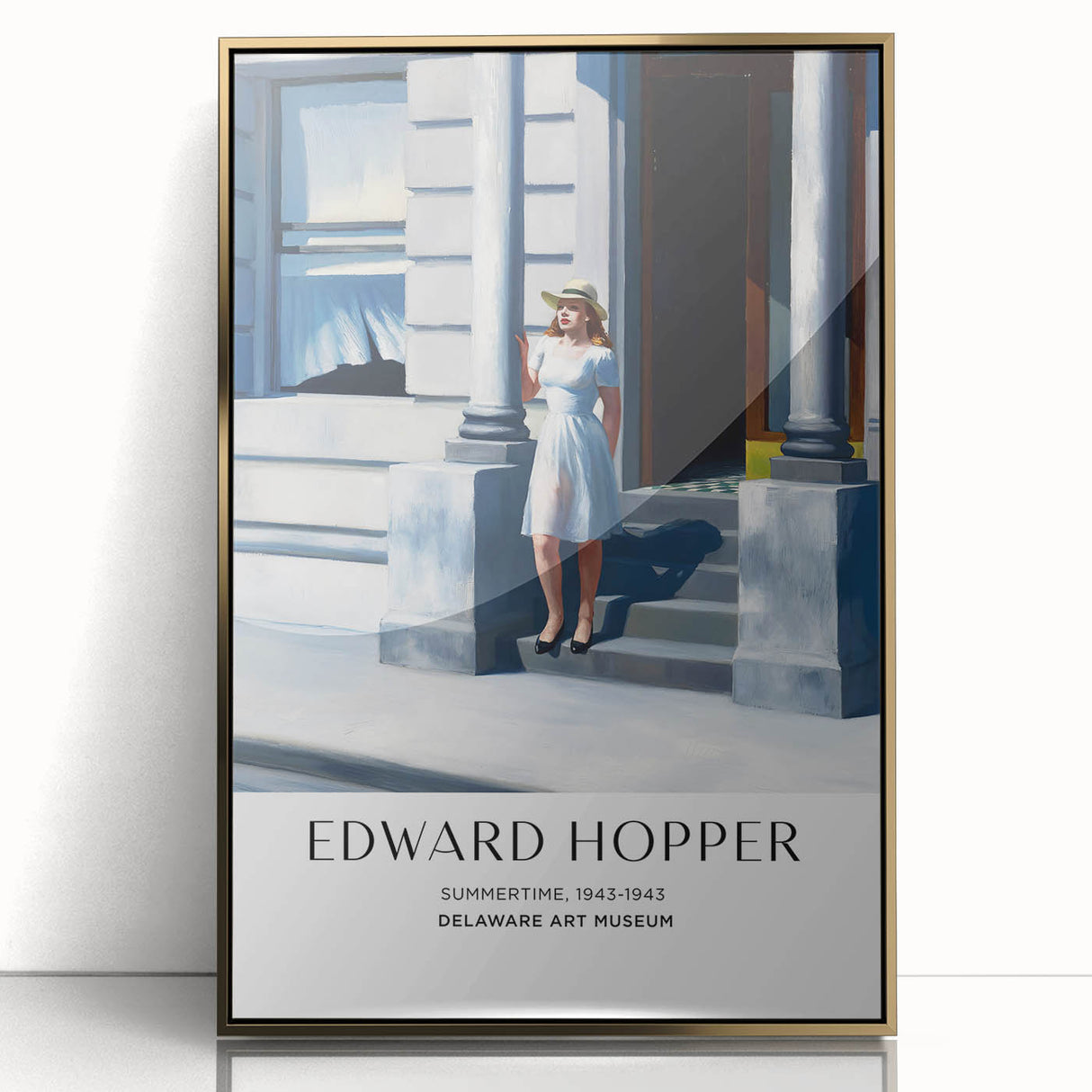Large art print featuring an Edward Hopper-inspired scene in muted colors, framed in gold acrylic.
