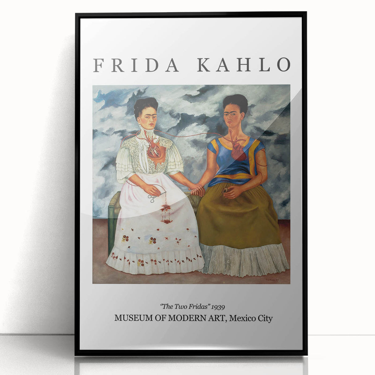 Large abstract wall art featuring a stylized Frida Kahlo portrait in muted colors, framed in black acrylic.
