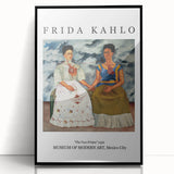 Large abstract wall art featuring a stylized Frida Kahlo portrait in muted colors, framed in black acrylic.