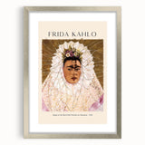 Textured abstract art print of Frida Kahlo in muted colors on a silver-framed canvas, ideal for bedroom art.