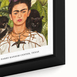 Close-up of a textured Frida Kahlo portrait in black wall art, featuring vibrant color accents, ideal for living room decor.