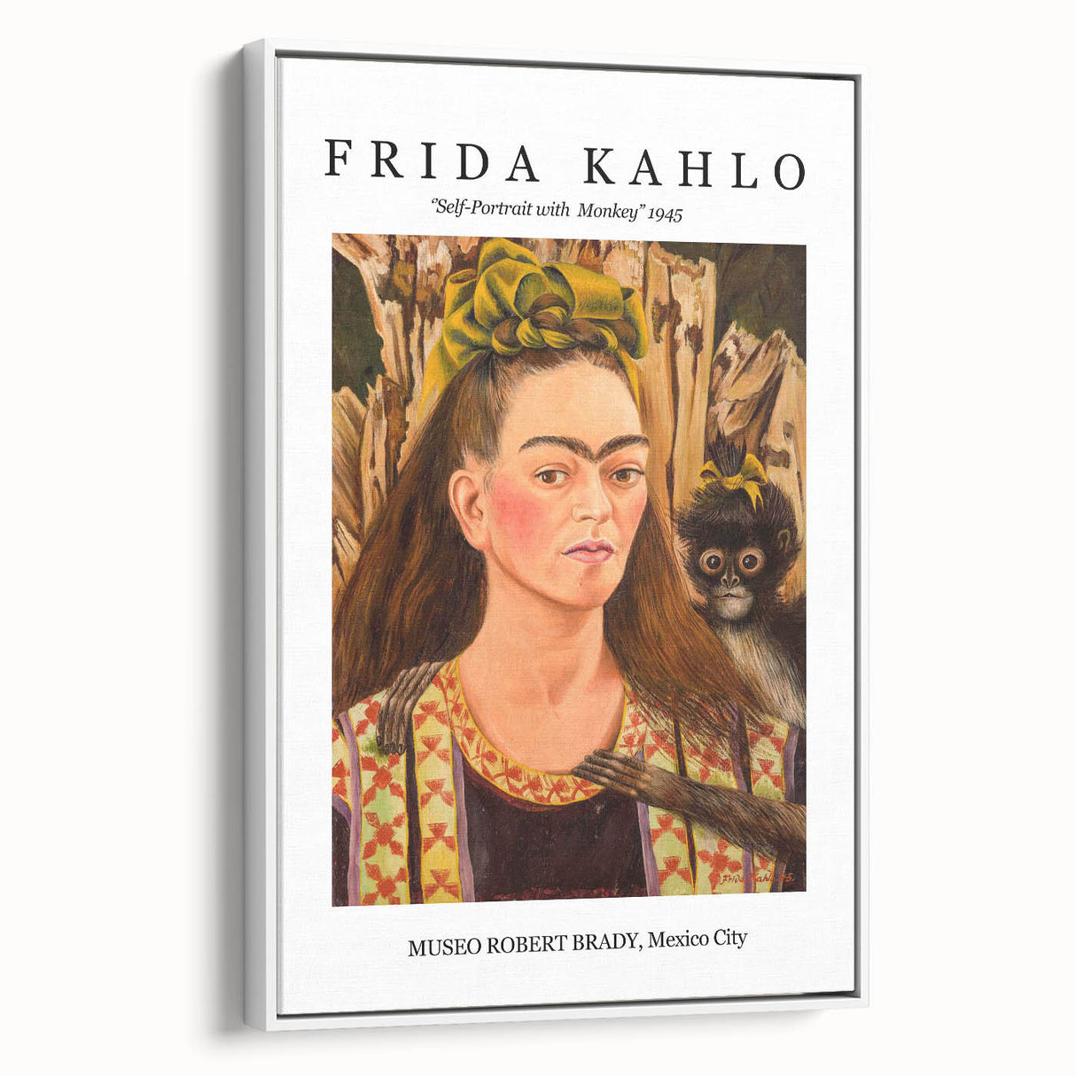 Framed canvas of vintage poster art featuring a colorful Frida Kahlo portrait on a black background.