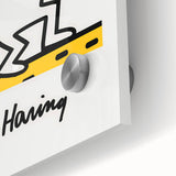 Large abstract wall art on acrylic glass featuring bold black and white Keith Haring figures, ideal for dining room art.