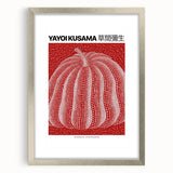 Textured abstract art print in vibrant red and white, framed in silver, ideal for modern bedroom ambiance.