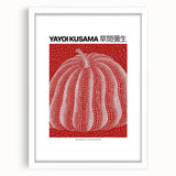 Abstract art print featuring polka dots in red and white, framed in white; suitable for bedroom or dining room decor.