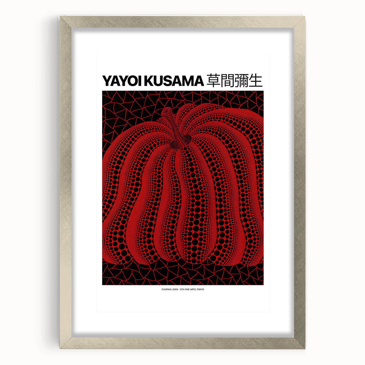 Textured abstract art print in vibrant red and black, framed in silver, ideal for modern bedroom decor.