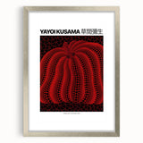 Textured abstract art print in vibrant red and black, framed in silver, ideal for modern bedroom decor.
