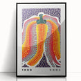 Large abstract wall art featuring a mid-century modernist design in vibrant colors on a black framed acrylic print.