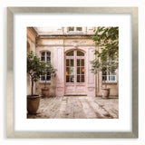 Textured abstract art print of a French door, rendered in neutral tones, framed with a silver mat.