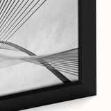 Close-up of a black framed canvas featuring a textured, colorful abstract design, ideal for extra large living room wall art.